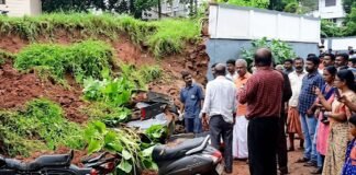 കനത്ത മഴ; മദർ ആശുപത്രിയുടെ ചുറ്റുമതിലിടിഞ്ഞ് വീണ് നിരവധി ഇരുചക്ര വാഹനങ്ങൾ തകർന്നു.